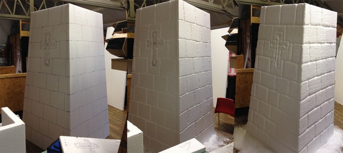 Draw then grind then wire wool to distress the stonework
