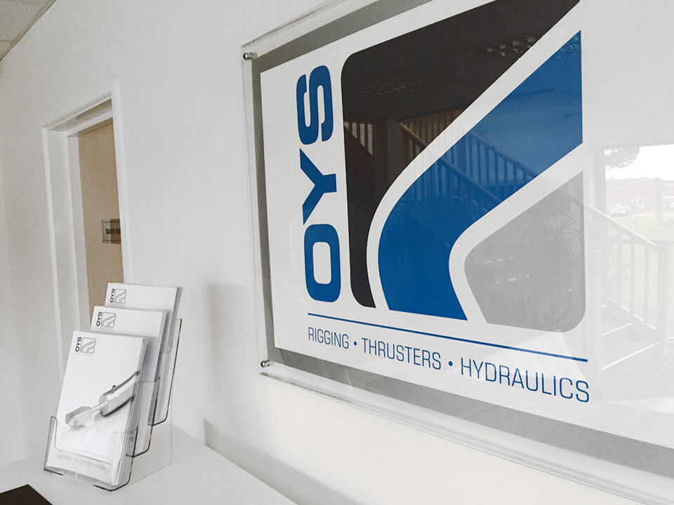 The new OYS logo working hard in the foyer
